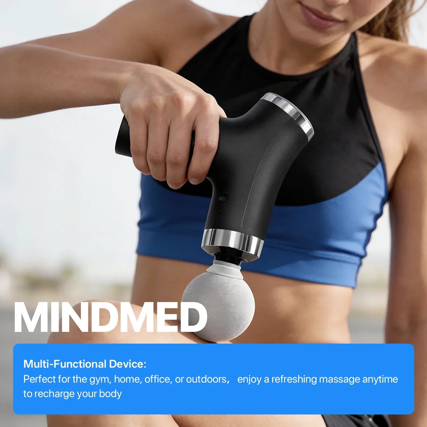 Person using a handheld massage device with 'MINDMED' branding, set against a neutral background.